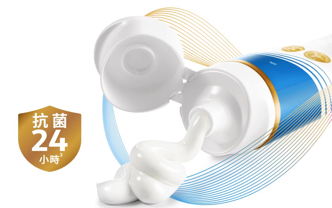 Escudo dorado con texto que dice 'Protección antibacterial 24 horas', destacando la protección prolongada que ofrece Colgate Total.